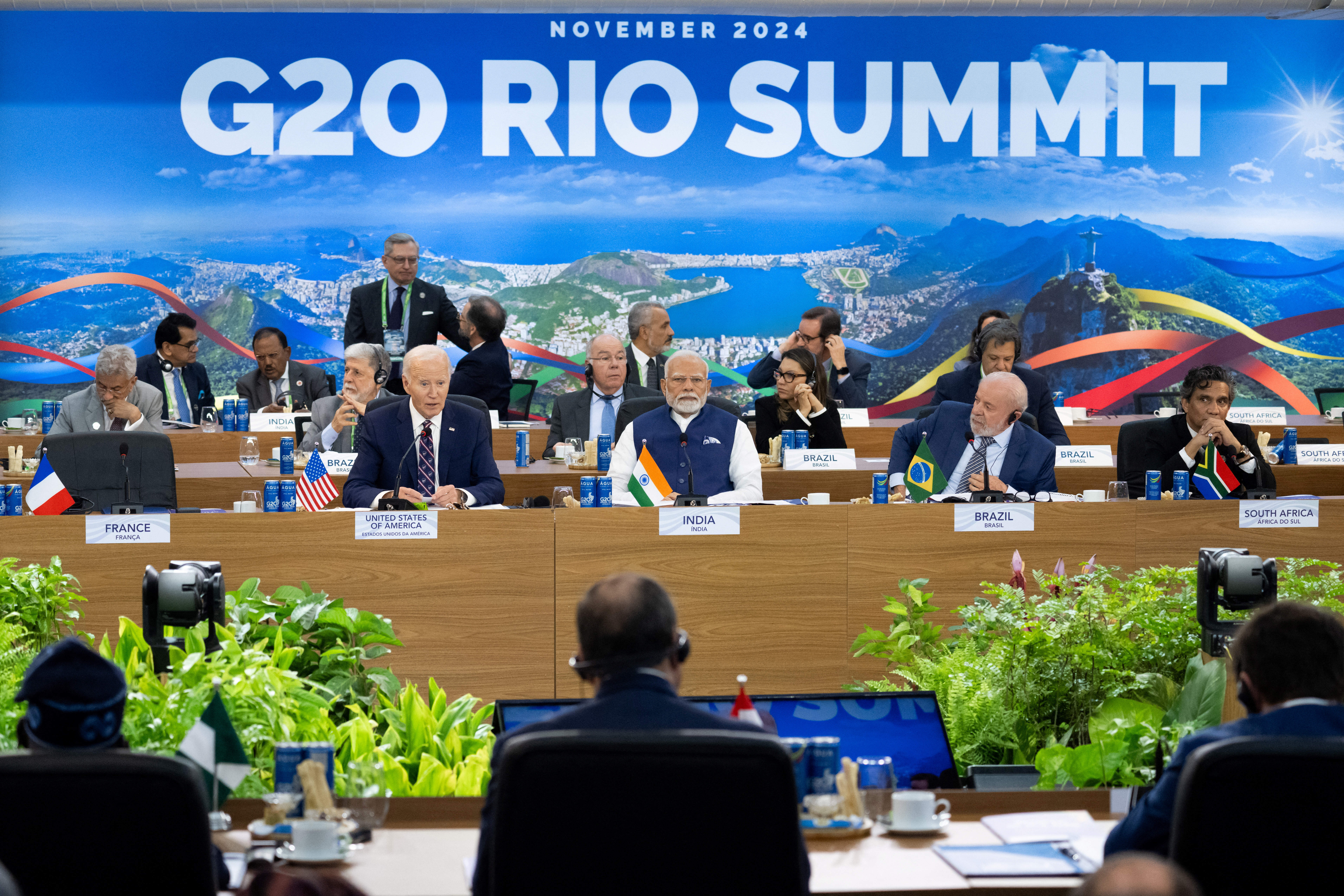 U.S. President Joe Biden, alongside Indian Prime Minister Narendra Modi and Brazilian President Luiz Inacio Lula da Silva speaks on the second day of the G20 Summit at the Museum of Modern Art in Rio De Janeiro, Brazil, November 19, 2024. Saul Loeb/Pool via REUTERS