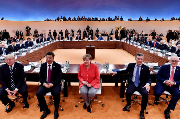 President Donald J. Trump, President Xi Jinping, Chancellor Angela Merkel, President Mauricio Macri, and Prime Minister Malcolm Turnbull at the G20 summit in Hamburg, Germany, July 7, 2017. (JOHN MACDOUGALL REUTERS)