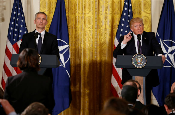 U.S. President Donald Trump (R) listens during a joint news conference with NATO Secretary General Jens Stoltenberg hold in the East Room at the White House in Washington, U.S., April 12, 2017. (Jonathan Ernst/Reuters)