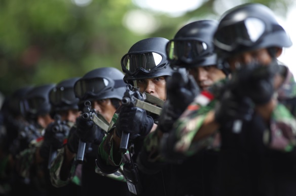 Members of the Indonesian army anti-terror squad take part in an anti-terror drill at the police special forces headquarter compound in Depok, Indonesia's West Java province (Beawiharta/Courtesy Reuters).