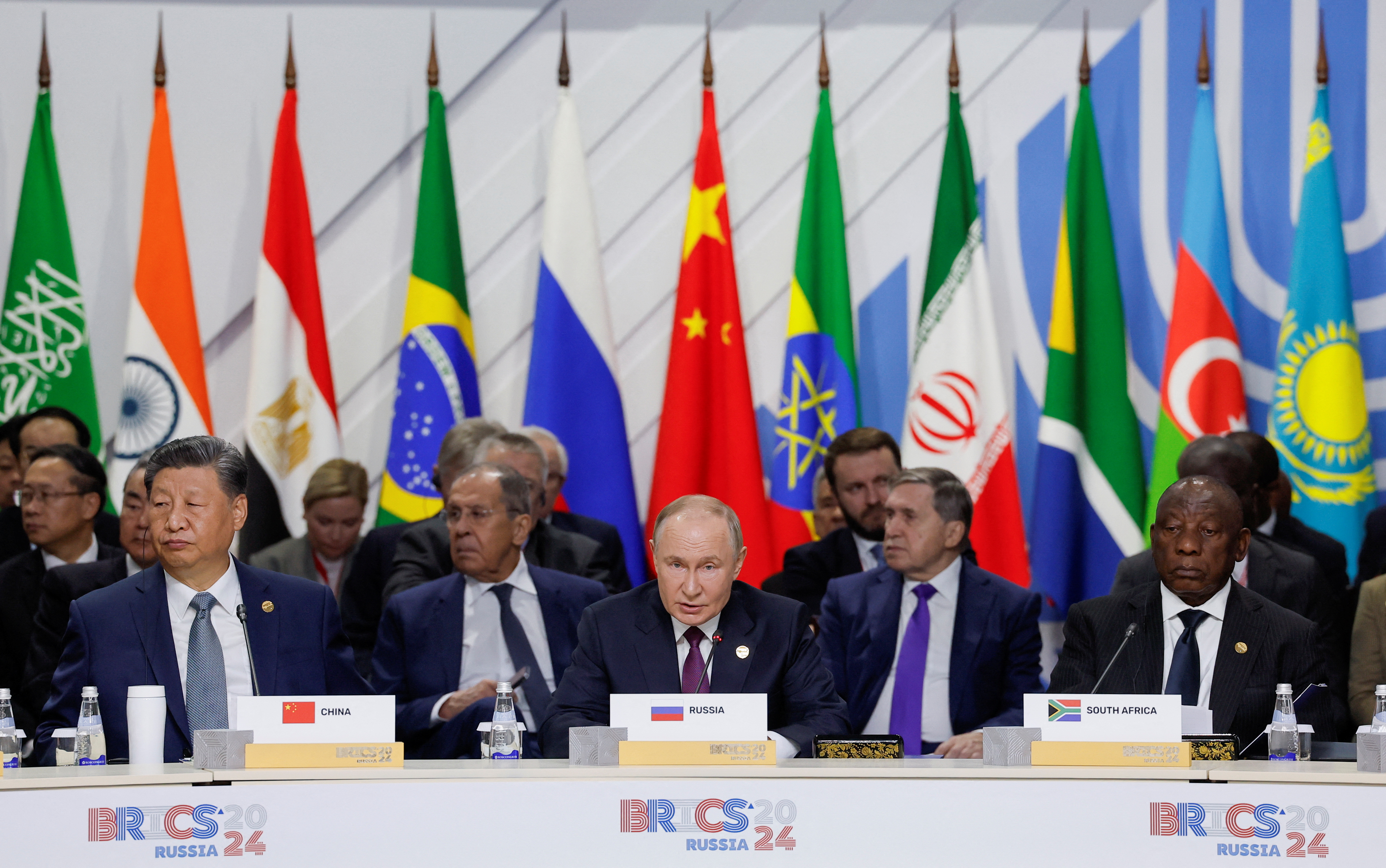 Officials, including South Africa's President Cyril Ramaphosa, Russia's President Vladimir Putin and China's President Xi Jinping, attend a plenary session in the outreach/BRICS Plus format at the BRICS summit in Kazan, Russia October 24, 2024. REUTERS/Maxim Shemetov/Pool