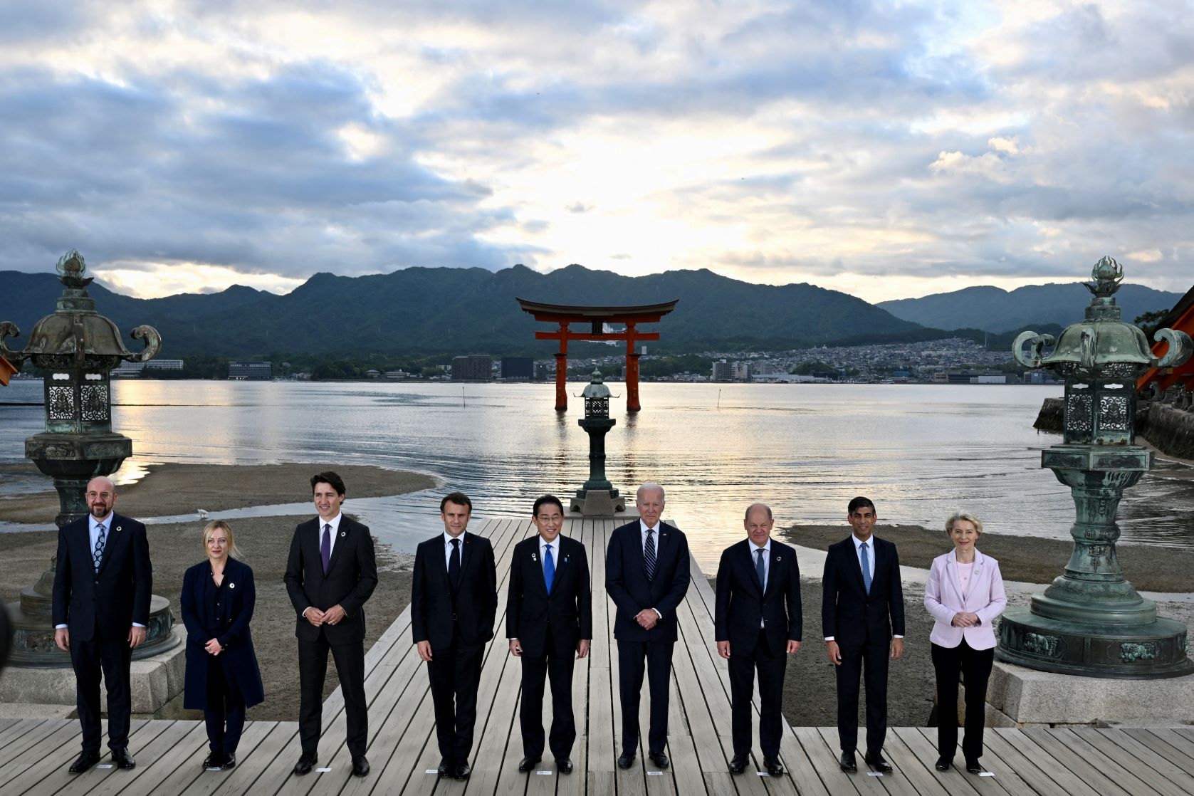 G7 leaders visit the Itsukushima Shrine, which is in the middle of a lake with sunlight reflecting off the water, on Miyajima Island in Hatsukaichi, Japan on Friday, May 19, 2023. Kenny Holston/Pool via REUTERS